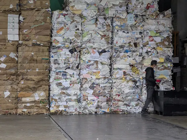 Stacked bales of mixed paper